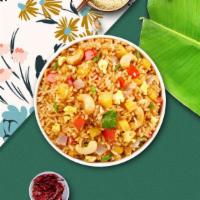 Pen Pinapple Pen Fried Rice · Stir fried rice with egg, pineapple, raisin, yellow onion, green onion, and cashew nut.