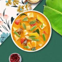 Plump Pineapple Curry · Red curry paste, tomato, pineapple, basil leaves, bell pepper.