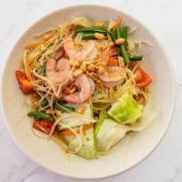Papaya Salad With Shrimp · exotic Thai shredded papaya salad enriched with flavor and topped with peanuts.