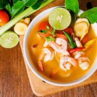 Tom Yum · The classic hot and spicy Thai soup with exotic Thai herbs and mushroom.