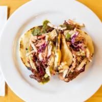 Tandoori · Our namesake tandoori grilled chicken, topped with tangy slaw and testy tomatillo chutney on...