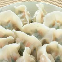 Steam Dumplings (8 Pcs) 煮水饺 · Pork and vegetable.
