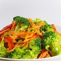 Yakisoba · Wheat noodle, broccoli florets, carrots, yellow onions all tossed in a wok. Garnished with g...