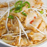Chow Fun · Large flat rice noodles are wok-tossed with scrambled eggs, onions, fresh sprouts and choppe...