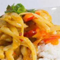 Coconut Curry · Delightful home-made yellow curry is simmered in a rich-velvety coconut cream with sliced ba...