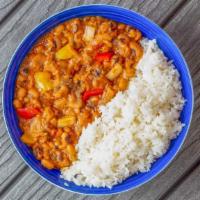 Black Eyed Pea Stew · Vegan. Black eyed peas and veggies stew served over white rice.