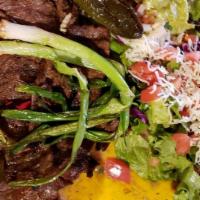 Carne Asada
 · Grilled skirt steak seasoned in our special spices. Served with sautéed green onions, guacam...