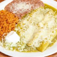 Enchiladas Combinadas
 · 2 enchiladas filled with crab, shrimp, tomatoes, mushrooms, and onions. Topped with avocado ...