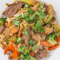 Pad See Ew · Stir fried wide rice noodles with broccoli, carrots, egg & soy sauce.
