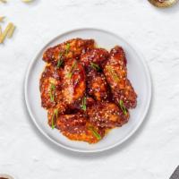 K'Town Wings · Breaded or naked fresh chicken wings, fried until golden brown, and tossed in korean BBQ sau...
