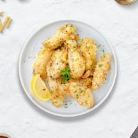 Garlic Gate Parmesan Wings (Boneless) · Boneless breaded fresh chicken wings, fried until golden brown, and tossed in garlic and par...