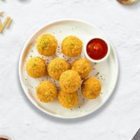 Mac The Ripper Cheese Balls · 10 Bite-size clumps of mac and cheese breaded and fried until golden brown. Served with your...