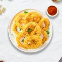Onion Ring Routing · Sliced onions dipped in a light batter and fried until crispy and golden brown.