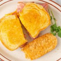Breakfast Sandwich · Scrambled eggs(2), american cheese, mayonnaise, your choice of ham, bacon, or sausage; serve...