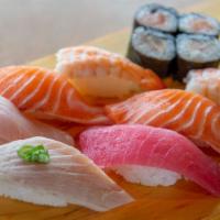 Dinner Sushi Nigiri · One tuna, one yellowtail, two prawns, one albacore, two salmons, and four pieces of assorted...