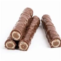 Chocolate Nut Roll With Almonds · Elegant dough rolled with chocolate nut and crushed almonds.