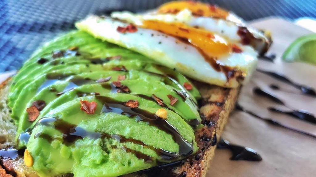 Classic Avocado · Hass avocado, two sunny side up eggs, red pepper, balsamic glaze.