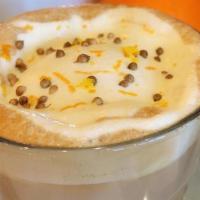 Orange Chiffon Latte · Orange, rose honeyed latte topped with house cream and coriander.
