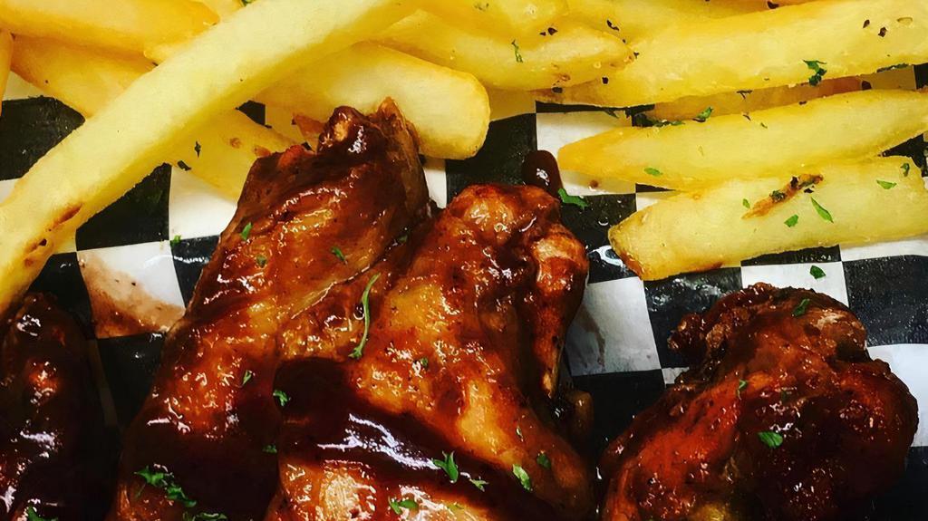 Crispy Fried Chicken Wings · Crispy fried chicken wings made to order sauced the way you want them
10 wings / With fries