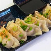 Gyoza · Choose either traditional or vegetarian.