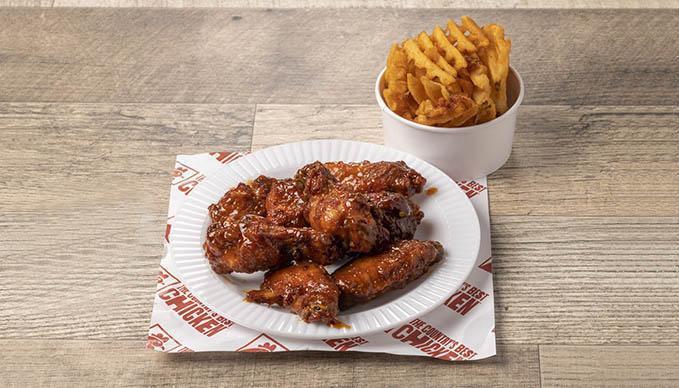 Traditional Wings Combo - 8 Piece · Looking for a delicious dinner? We're all for wingin' it with our wings combos! Get 8 traditional or boneless wings with one of our delicious sides.