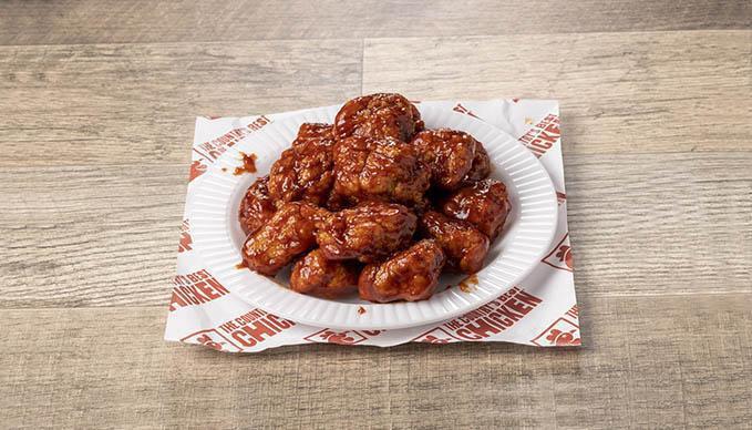 Boneless Wings - 16 Piece · Our wings come in our choice of bone-in or boneless and your choice of sauce. Available in 8 or 16 pieces.  Eat them alone or pair them with a side and a dipper.