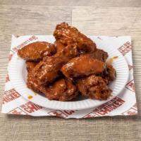 Traditional Wings - 16 Piece · Our wings come in our choice of bone-in or boneless and your choice of sauce. Available in 8...