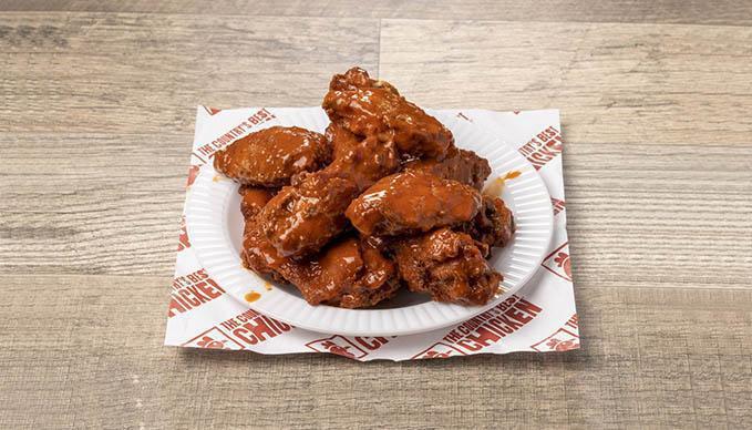 Traditional Wings - 16 Piece · Our wings come in our choice of bone-in or boneless and your choice of sauce. Available in 8 or 16 pieces.  Eat them alone or pair them with a side and a dipper.