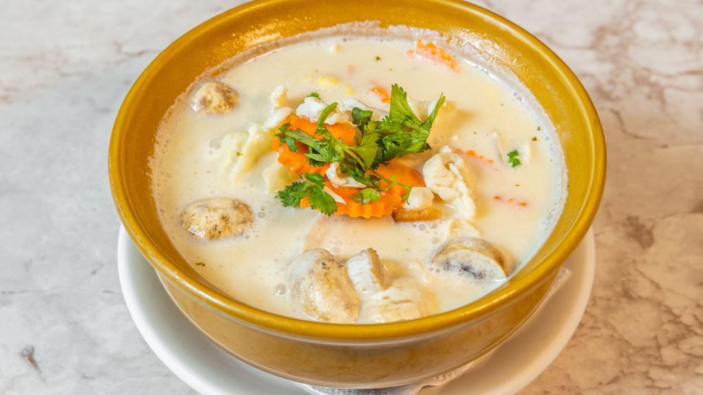 Tom Kha · Serves for two. lemongrass soup with cabbage carrot mushroom and coconut milk.