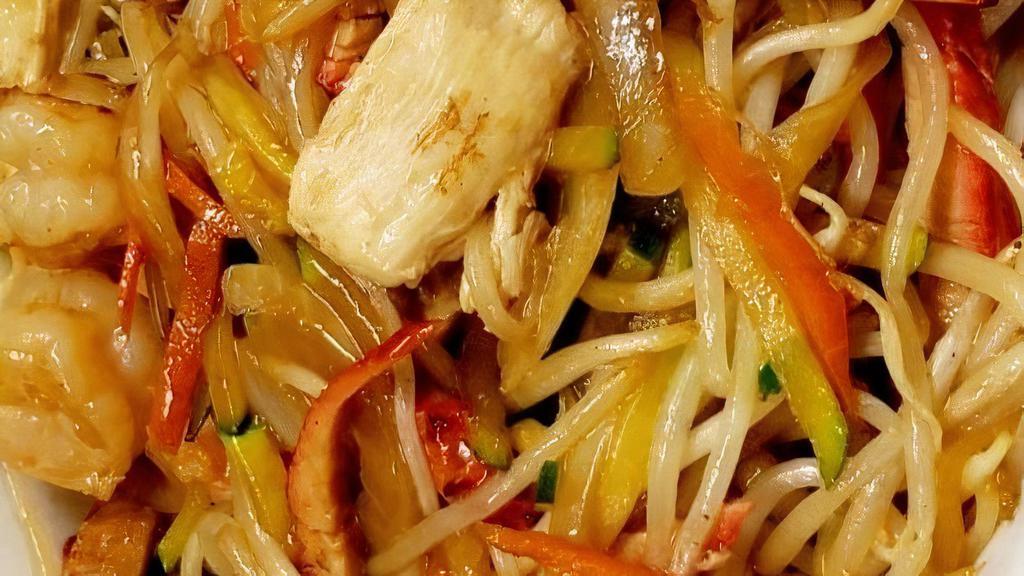 Mandarin Noodles · Shrimp, chicken, BBQ pork and mix vegetables stir fried with special sauce on top of soft white egg noodles.