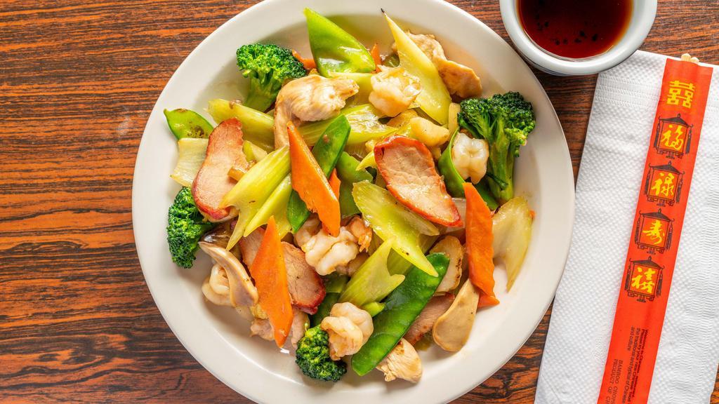 Happy Family · Shrimp, chicken, BBQ pork stir fried with seasonal vegetables.