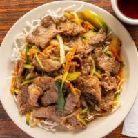 Mongolian Beef · please choose a spicy level from 1 to 5 stars. Sliced beef cooked in special sauce, garnishe...