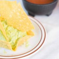 Guacamole And Chips · Home made guacamole ,Served with chips and salsa.
contains dariy