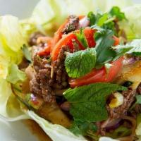 Beef Salad · Charbroiled beef with cucumber, red onion, tomato, cilantro in a spicy lime sauce. Tastes gr...