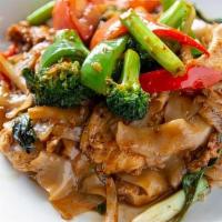 Phad Kee Mao. · Stir-fried fresh wide rice noodles in our house made roasted chili sauce, egg, sweet basil, ...
