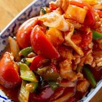 Sweet & Sour. · Stir-fried onion, cucumber, tomato, pineapple and bell pepper in tangy sweet & sour sauce.
