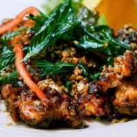 Crispy Garlic Chicken. · Chicken breast battered and deep-fried, sautéed in a rich garlic sauce, top with crispy basil.