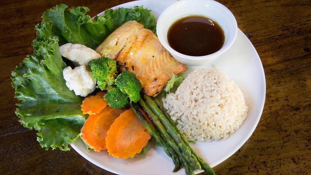 Grilled Wild Salmon · Barbecued filet of wild caught Alaskan Coho salmon served with fresh grilled broccoli, asparagus, cauliflower and carrots. Served with ginger sauce and choice of white or brown jasmine rice