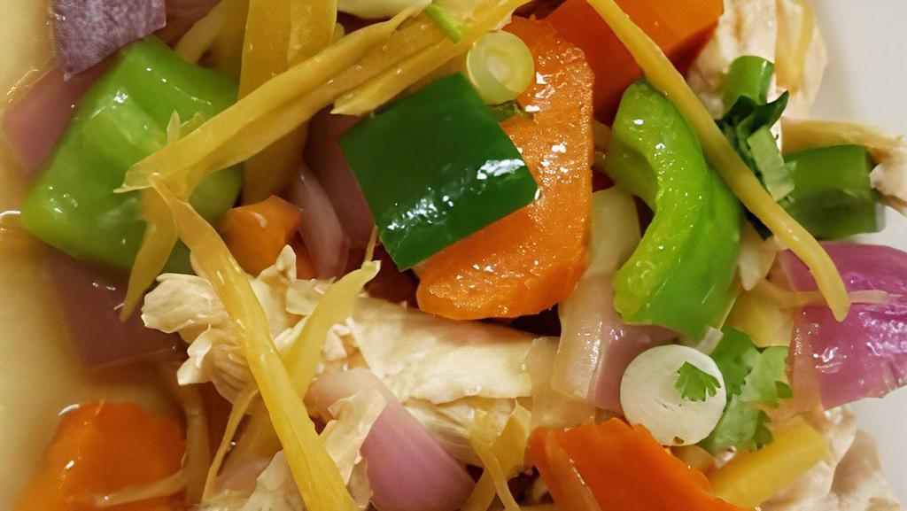 Stir Fried Ginger · Ginger, red onion, zucchini, mushroom, carrot, cabbage, bell pepper, tomato, green onion and cilantro.