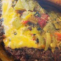 Green Chile Cheeseburger · Two Hand pressed sirloin burgers topped with cheese, green Chile and choice of lettuce, toma...