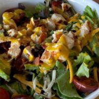 Cali Crunch Salad · Spring mix, loaded with, crunchy Bacon pieces, grilled Chicken, cherry Tomatoes, creamy Avoc...
