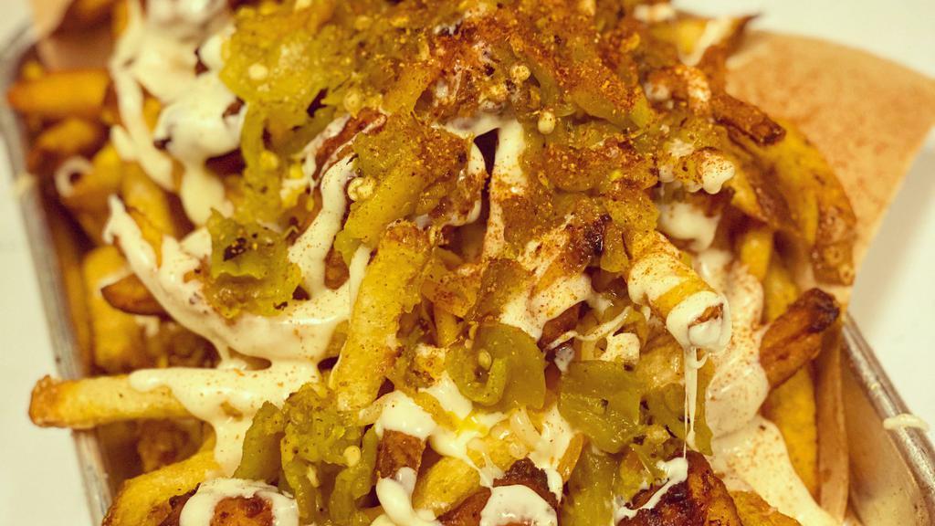 Burqueno Fries · Hand cut, Cajun seasoned fries and topped with fiesta blend cheese, queso blanco and green Chile.