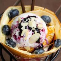 Blueberry Ny Cheesecake Crepe · Blueberries, blueberry reduction, whipped cream cheese, custard cream, whipped yogurt, vanil...