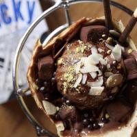 Chocolate Nut Party Crepe · Almonds, chocolate truffles, whipped yogurt, chocolate custard cream, chocolate sauce, choco...