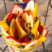 T-Swirl Fruit Cocktail Crepe · Sliced strawberries, sliced bananas, blueberries, raspberries, mangos, custard cream, whippe...