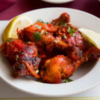 Tandoori Chicken Full · The showpiece of Indian culinary art – marinated chicken cooked in the clay oven