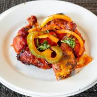 Tandoori Chicken Half · The showpiece of Indian culinary art – marinated chicken cooked in the clay oven