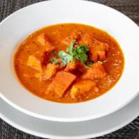 Paneer Tikka Masala · Grilled cubed Indian cottage cheese cooked in our signature tomato buttery sauce