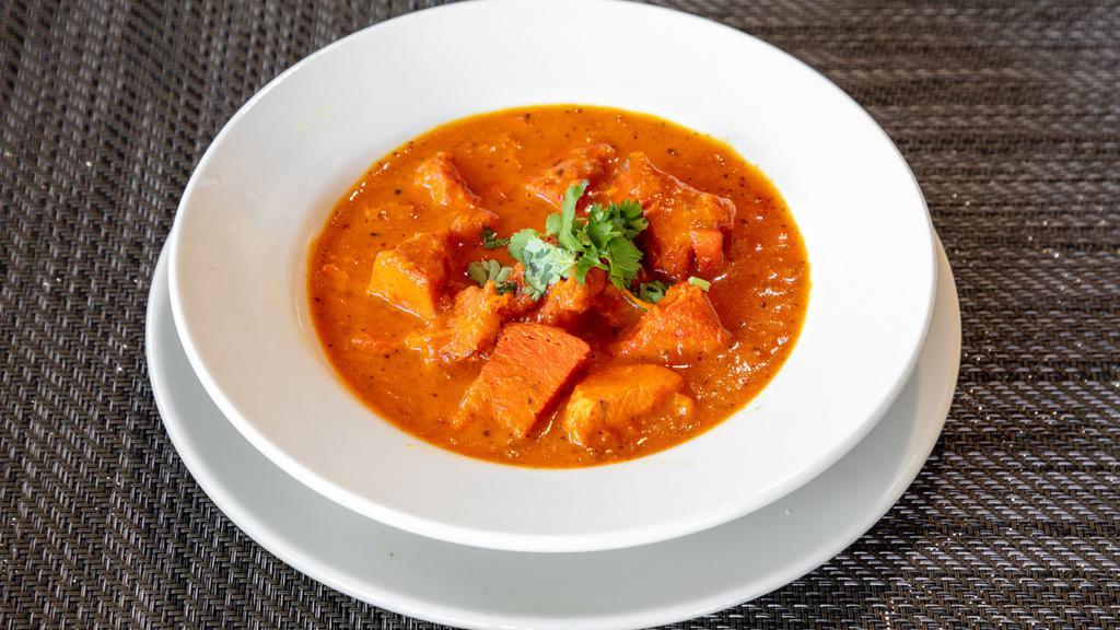 Paneer Tikka Masala · Grilled cubed Indian cottage cheese cooked in our signature tomato buttery sauce