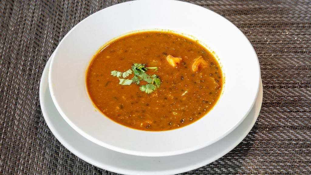 Dal Tadka · Yellow lentils cooked in mild spice